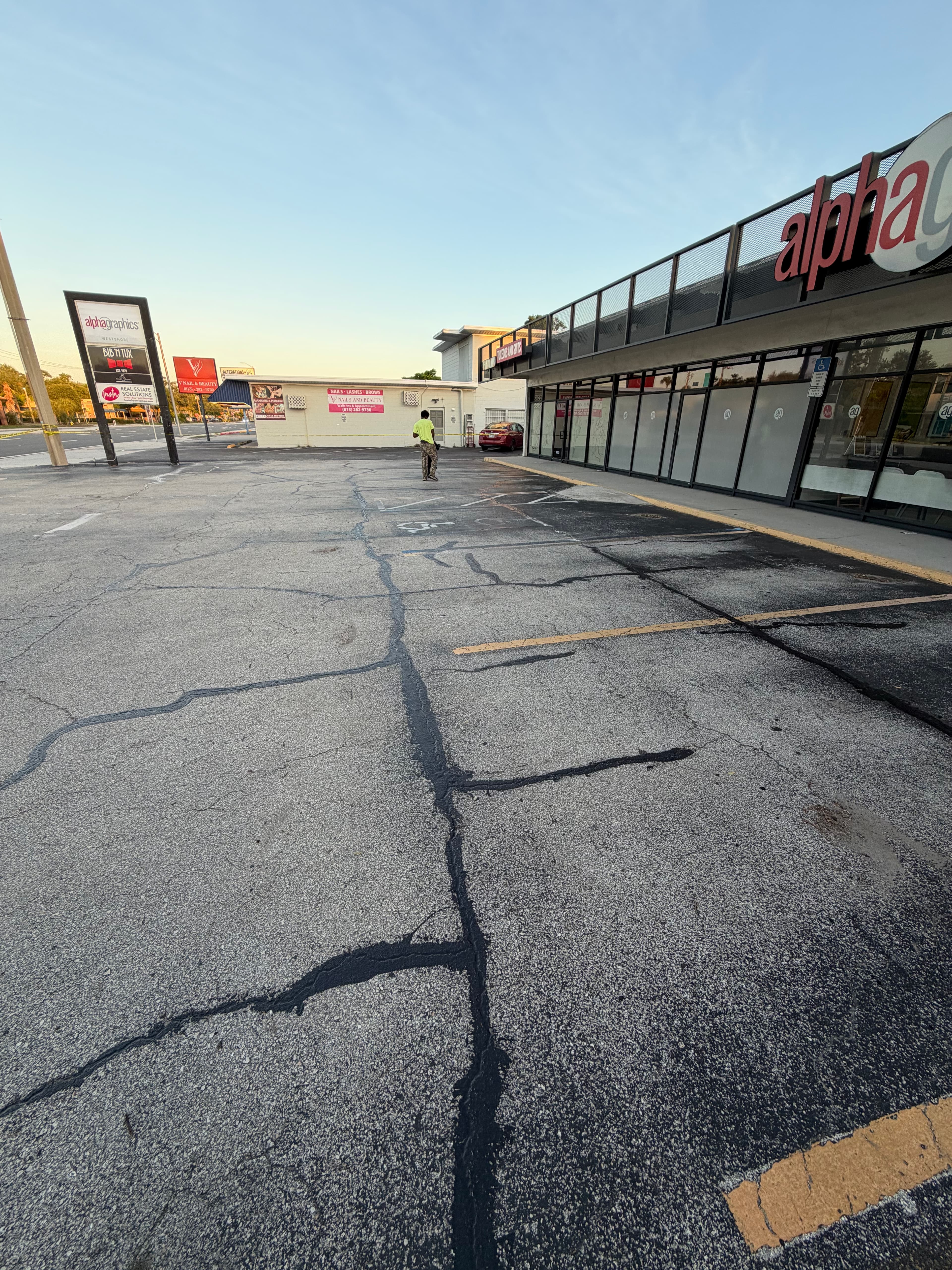 Hot pour rubberized sealant applied to a crack in asphalt