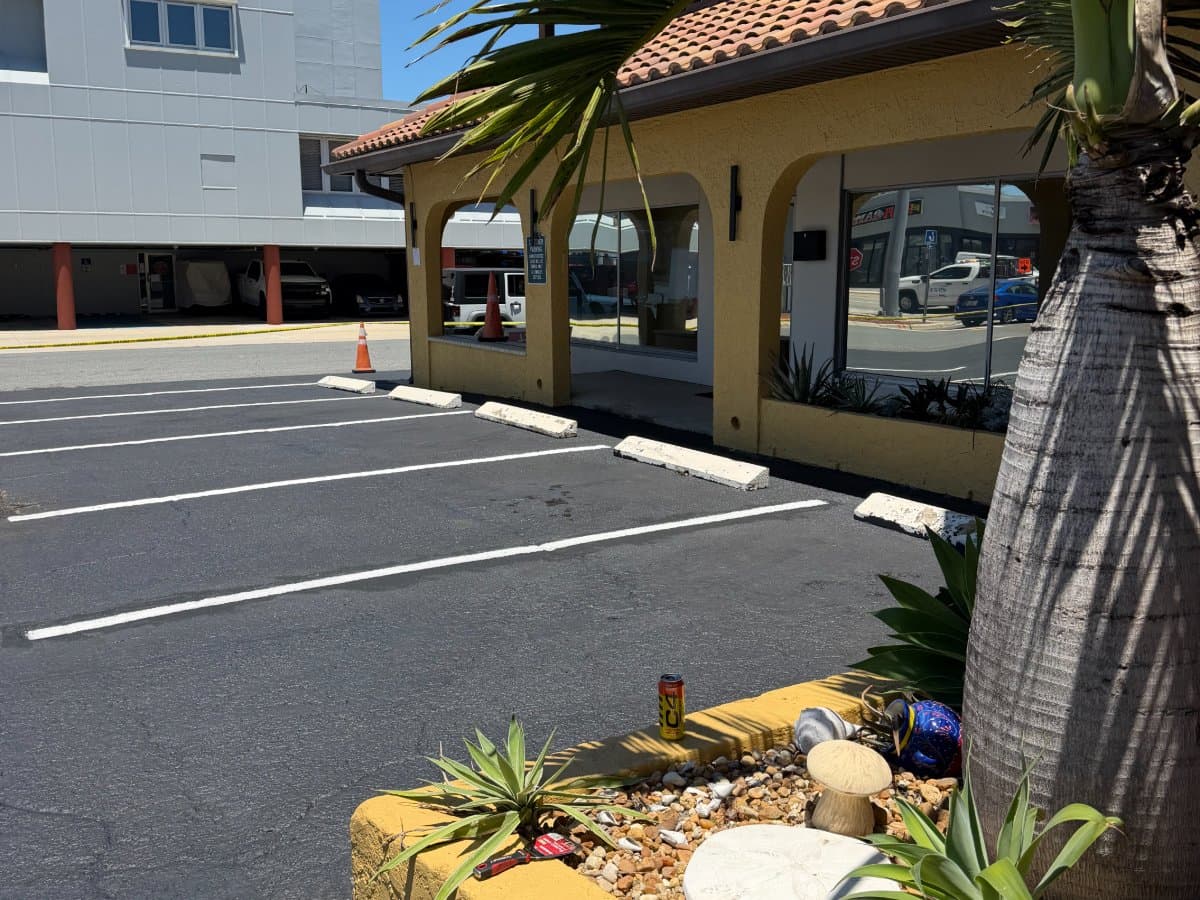 Fresh white striping next to building